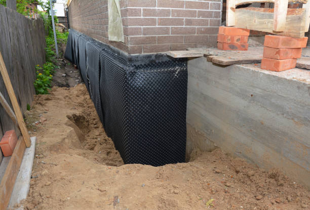 Happy homeowners after waterproofing job in White Bluff